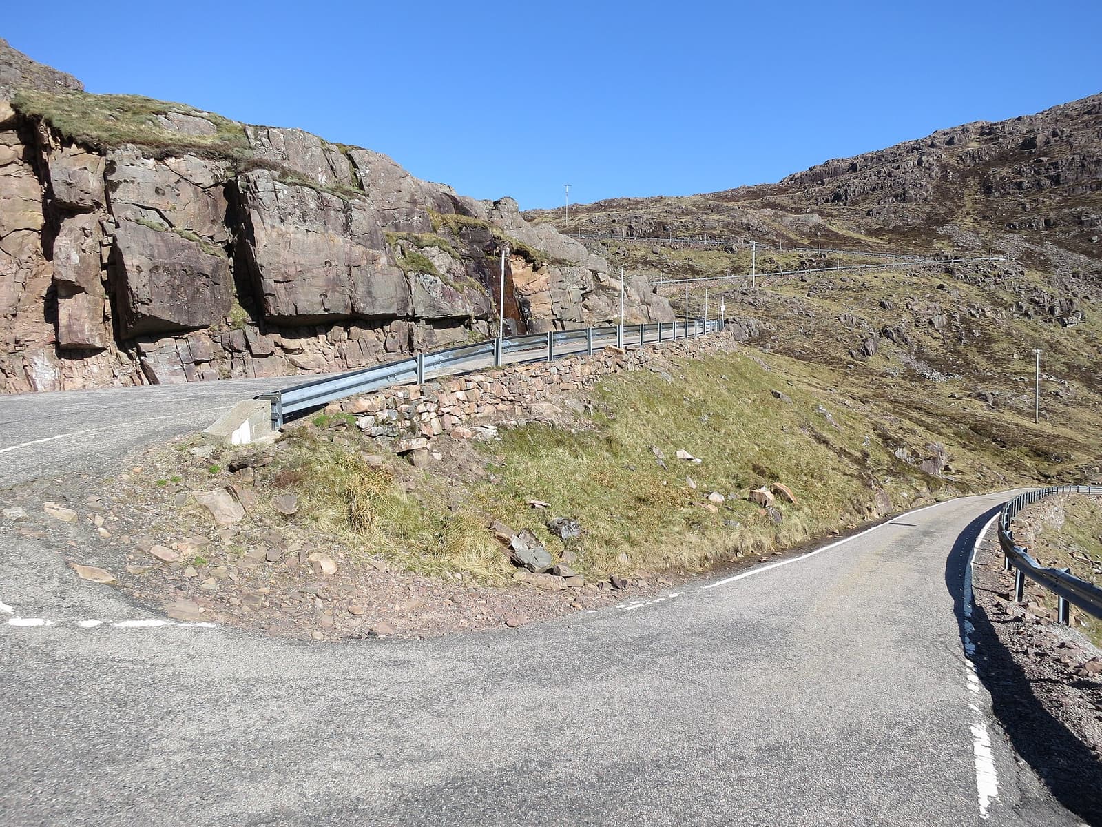 A hairpin bend on the steep single-track road over the Bealach na Bà pass