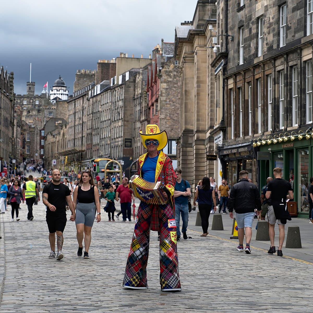 Crowds and street performers on the Royal Mile during the Edinburgh Festival Fringe