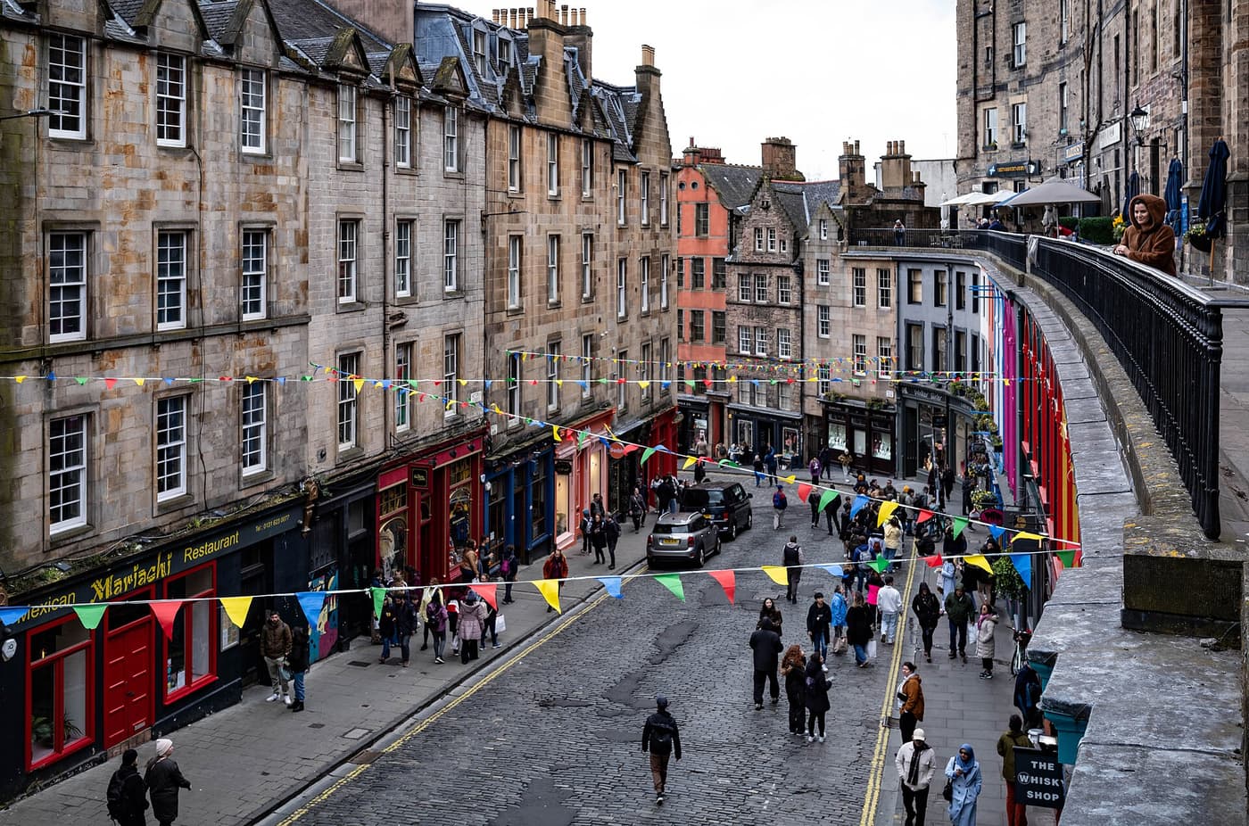 The curving, colourful shopfronts of Victoria Street in Edinburgh’s Old Town