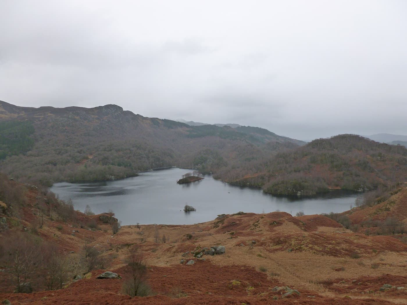 Loch Katrine among wooded hills in the Trossachs