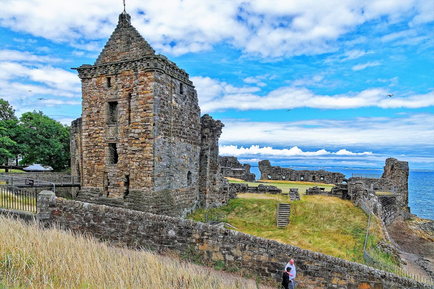 The ruins of St Andrews Castle on a headland above the sea